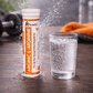 “L-Arginine effervescent tablets container with fizzy health supplement branding ARGIMIC”