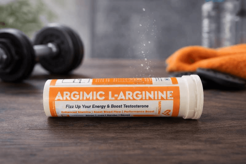 “L-Arginine effervescent tablets container with fizzy health supplement branding ARGIMIC”